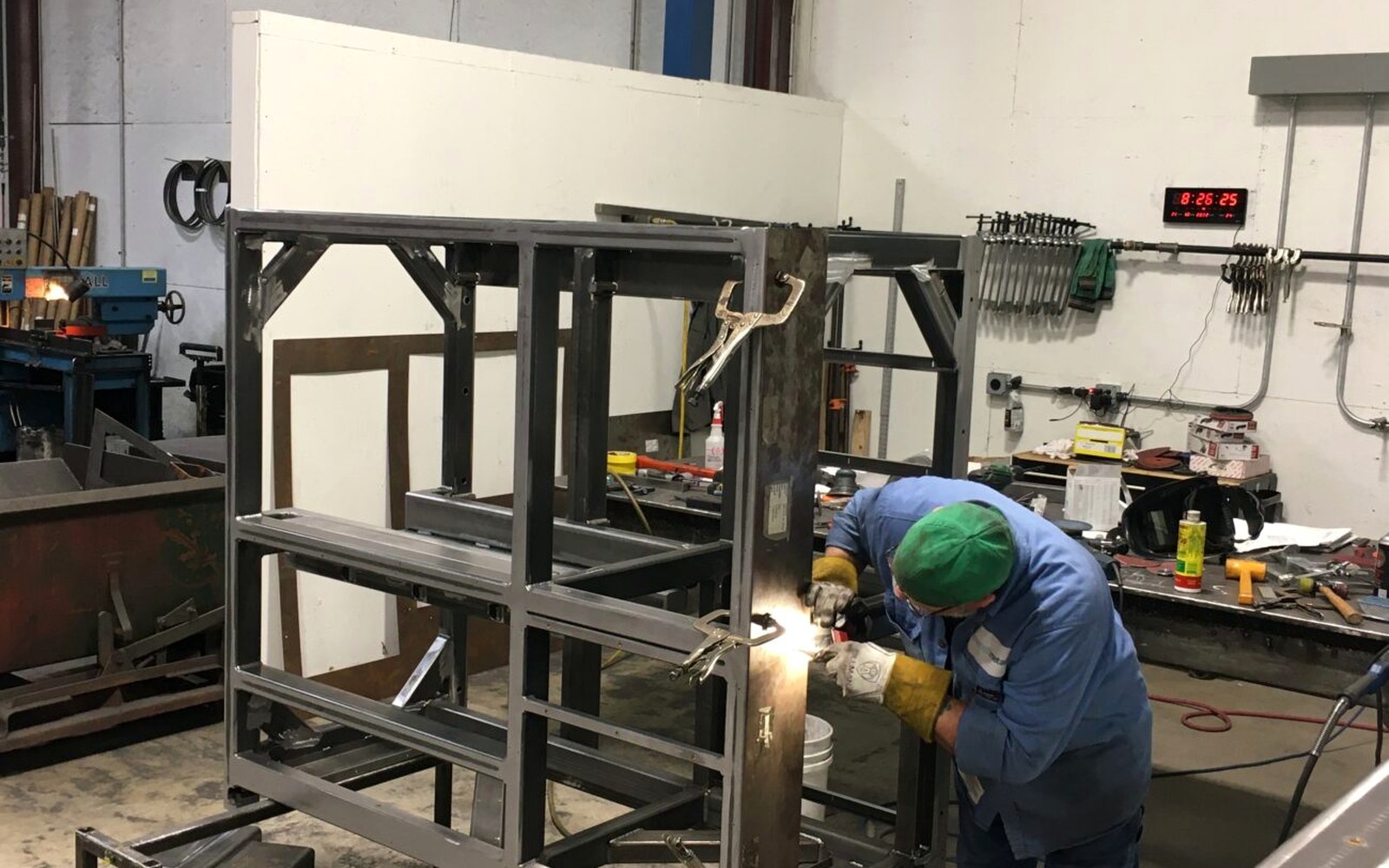 Steel gate frame being fabricated in a workshop